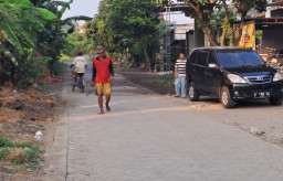 Penyelesaian Paving Jalan Program TMMD Bawa Dampak Positif Warga Desa Penambangan