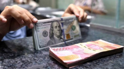 Rupiah Masih Bertengger Rp 18 Ribu, BI Tuding The Fed