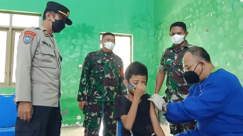 Sasar Warga Pelosok Desa, Polres Kediri Kota Gencarkan Vaksinasi Anak dan Boster