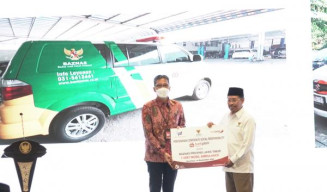 Bank Jatim Serahkan CSR Pada BAZNAS Jatim