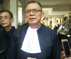 Kasus UU ITE Guntual Laremba dan Istri Dinyatakan P21