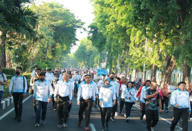 Peringati HUT Lalu Lintas ke-67, Polda Jatim GelarJalan Sehat dan Lomba Mewarnai Anak-anak