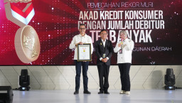 Bank Jatim Pecahkan Rekor MURI 2.312 Debitur Tanda Tangan Akad Massal Kredit Konsumer