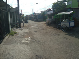 Aspal di Pasar Japanan Rusak, Warga Minta Segera Diperbaiki