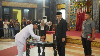 PJ Bupati Lantik 14 Kepala Desa Hasil Pilkades Serentak Gelombang III