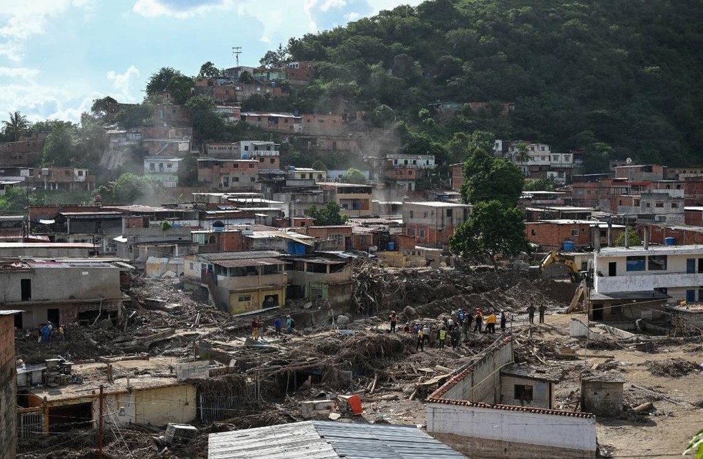 Tanah longsor yang melanda Las Tejerias, Venezuela. Federico Parra/AFP