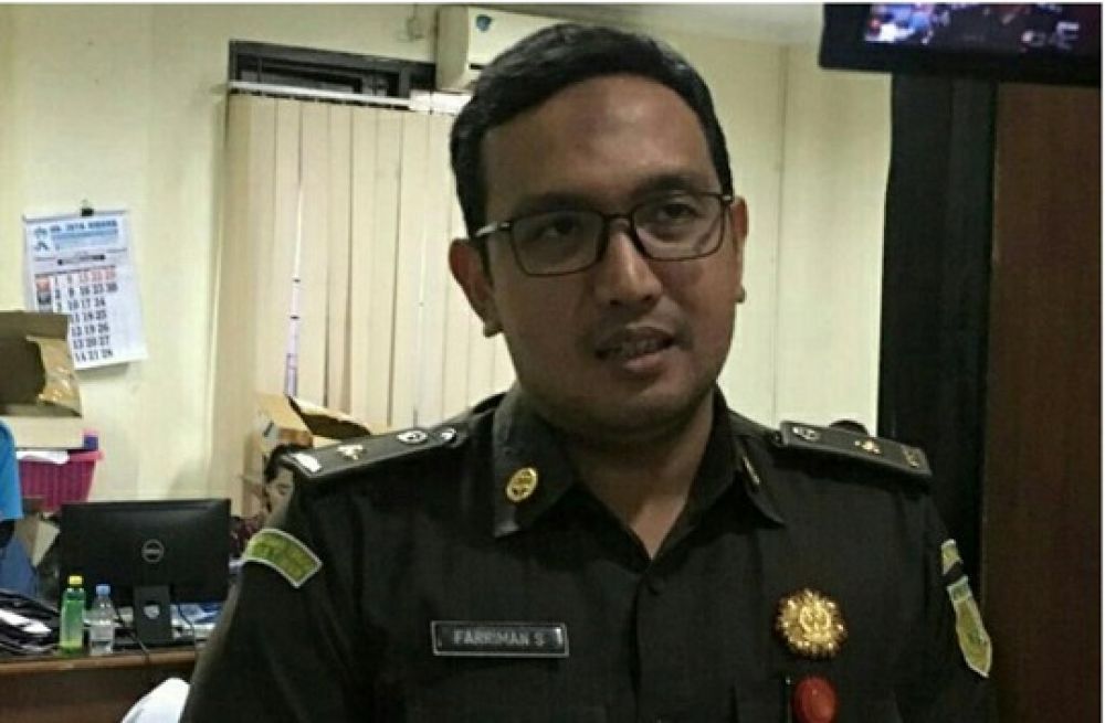 Kepala Seksi Pidana Umum (Kasipidum) Kejari Surabaya Fariman Isandi Siregar. SSP/BUDI