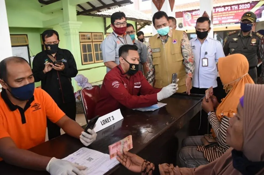 Gandeng PT POS Indonesia, Pemkab Mojokerto Mulai Cairkan Bantuan