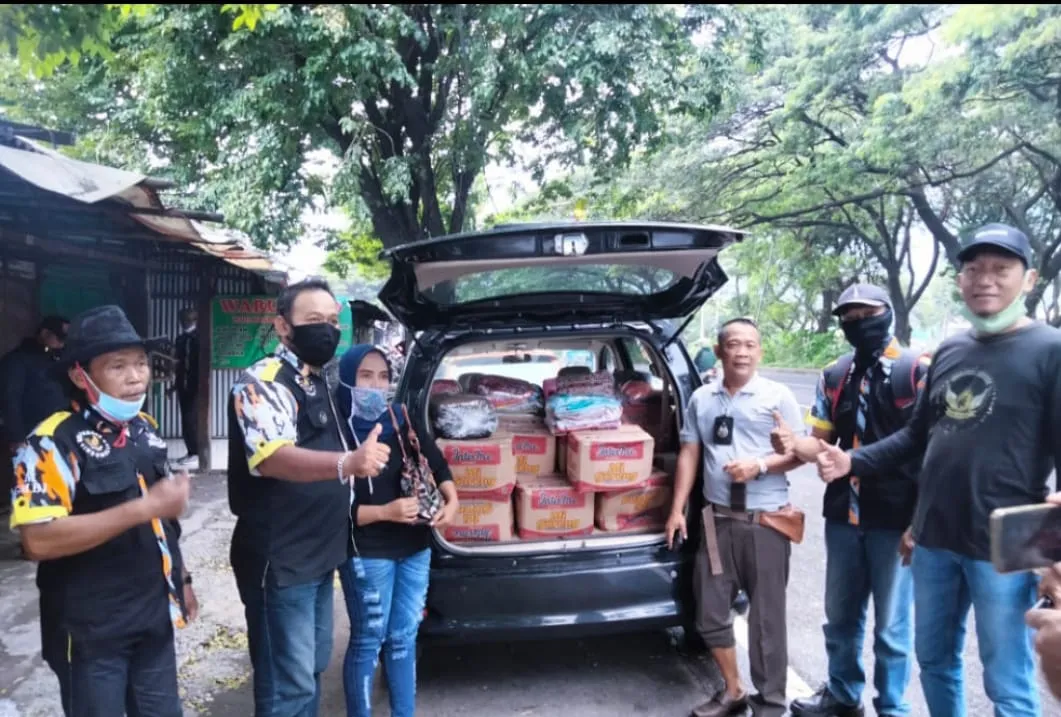 Peduli Korban Banjir LSM GMBI Distrik Pasuruan Raya Salurkan Bantuan