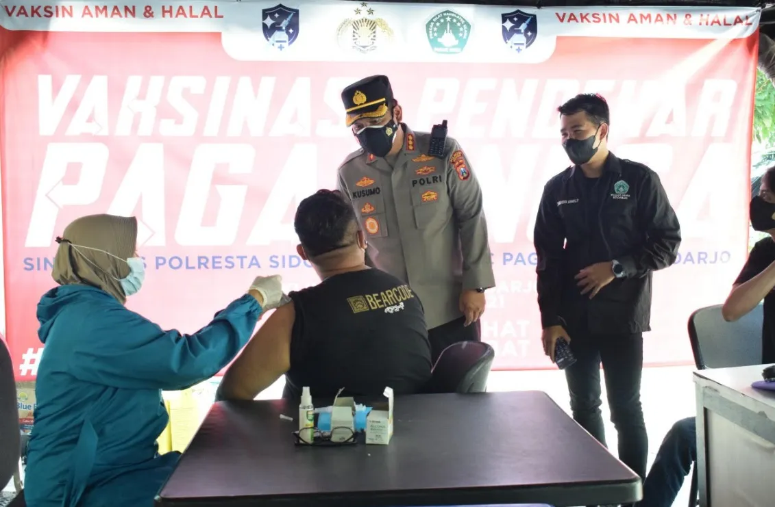 Polresta Sidoarjo Suntik Vaksin Covid-19 Pendekar Pagar Nusa