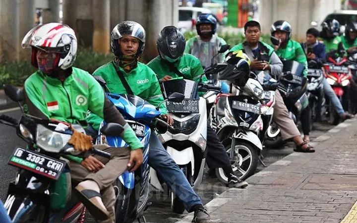 Profesi Ojek Online Masih Menggiurkan