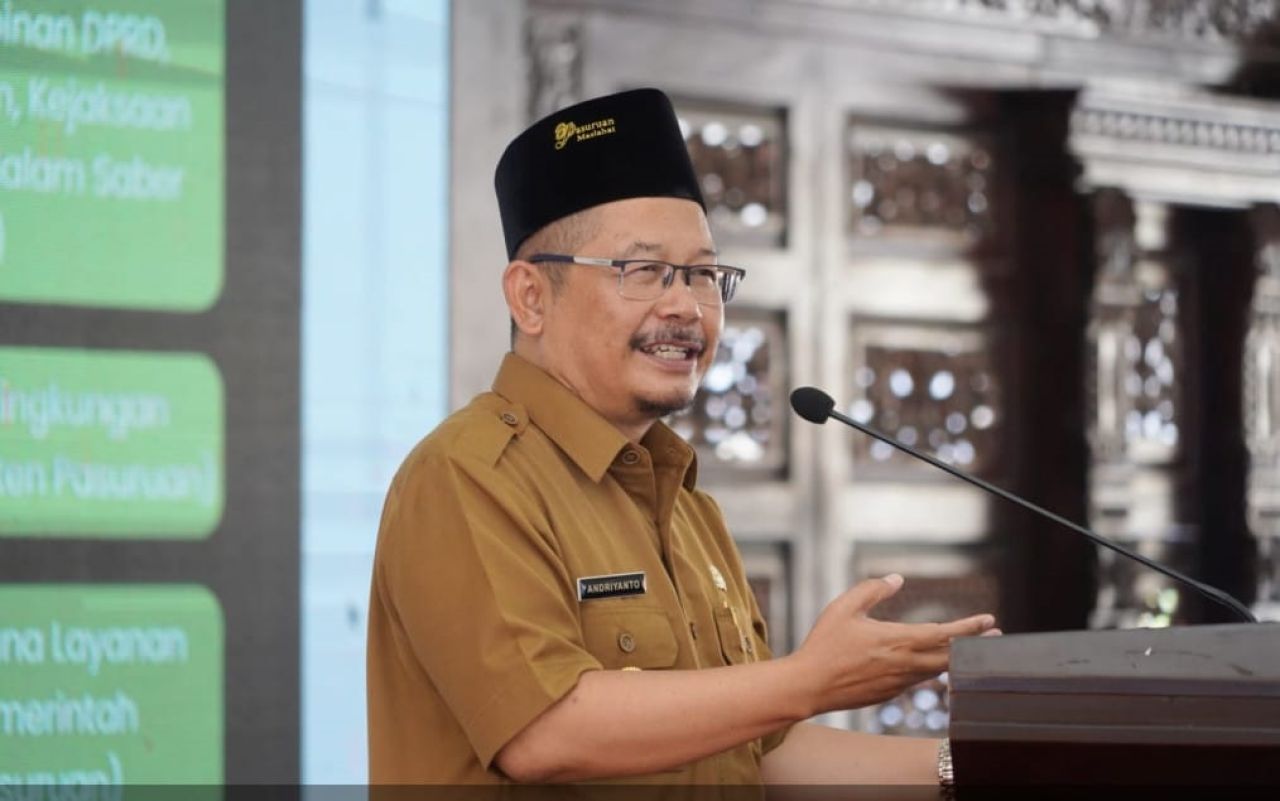 Pj Bupati Pasuruan Adriyanto saat pidato setelah mendapat penghargaan dari Lembaga Kebijakan Pengadaan barang/jasa (LKPP)