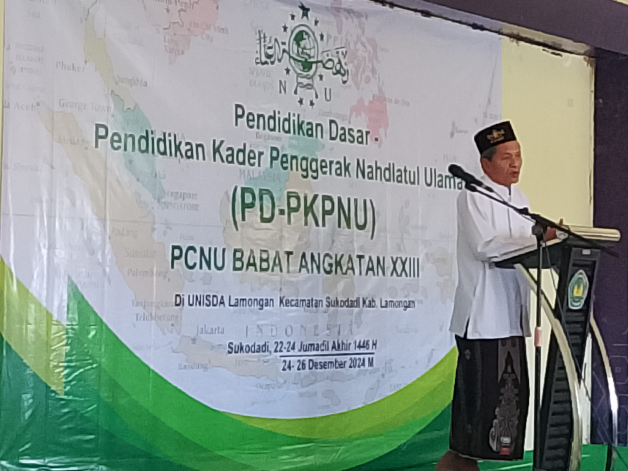 Ketua Tanfidziah PCNU Babat, KH. Ma'mun Afandi saat membuka PD-PKPNU yang digelar oleh MWC NU Sukodadi.  FOTO:SP/MUHAJIRIN