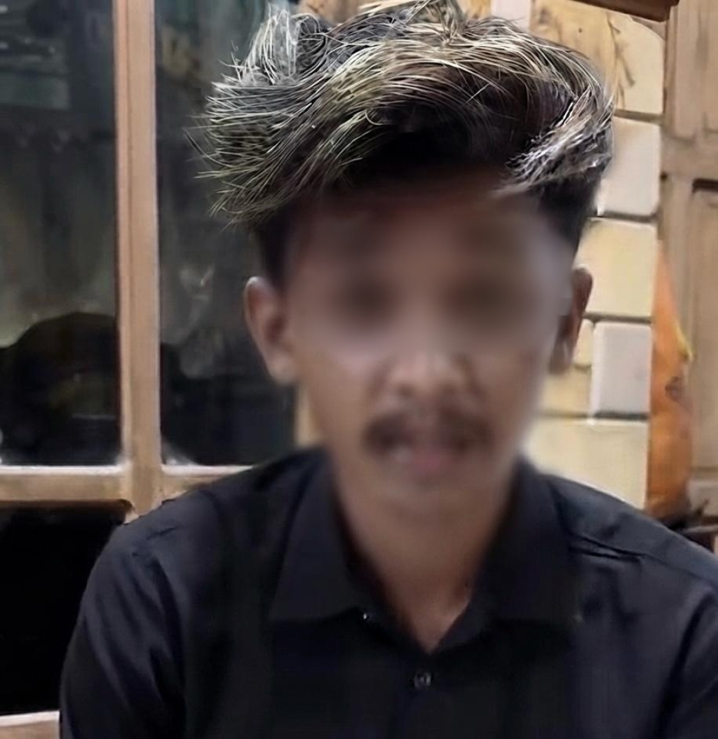 AL terduga pelaku yang merekam perias saat berada di kamar mandi. 
