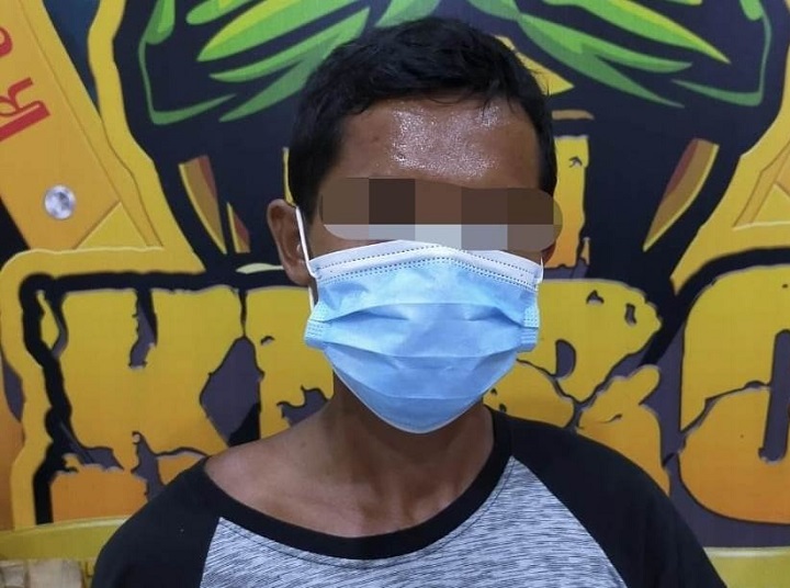 MAD, pelaku saat diamankan polisi. 