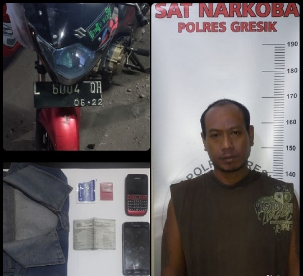 Tersangka Kukuh dan barang bukti saat diamankan di Polres Gresik.
