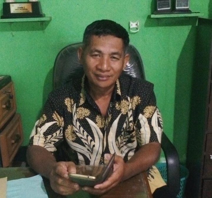 H Muhamad Husin, Kepala Desa Kenongo Kecamatan Tulangan.