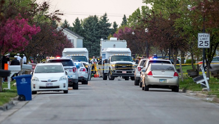 Penyelidik bekerja di lokasi di mana penembakan fatal oleh seorang petugas polisi terjadi di Columbus, Ohio, AS, 20 April 2021. SP/REUTERS / GAELEN MORSE