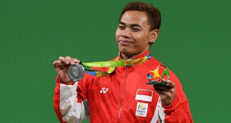 Eko Yuli Irawan saat berhasil mendapatkan mendali perak di Olimpiade Tokyo 2020. SP/ Olimpiade Tokyo