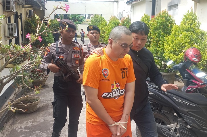 Ruslan Tedjokusumo, saat ditangkap usai membunuh rekan bisnisnya sendiri Eddi Santoso hanya karena punya hutang Rp 1,4 Miliar untuk main trading.