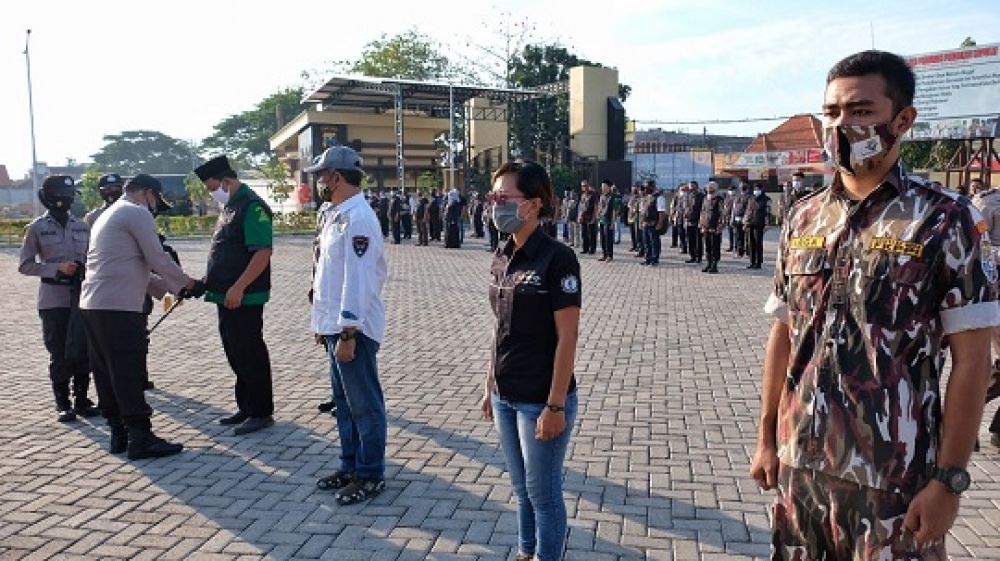 Kapolresta Sidoarjo saat melaunching Satgas Komunitas Protokol Kesehatan Sidoarjo. SP/Sugeng