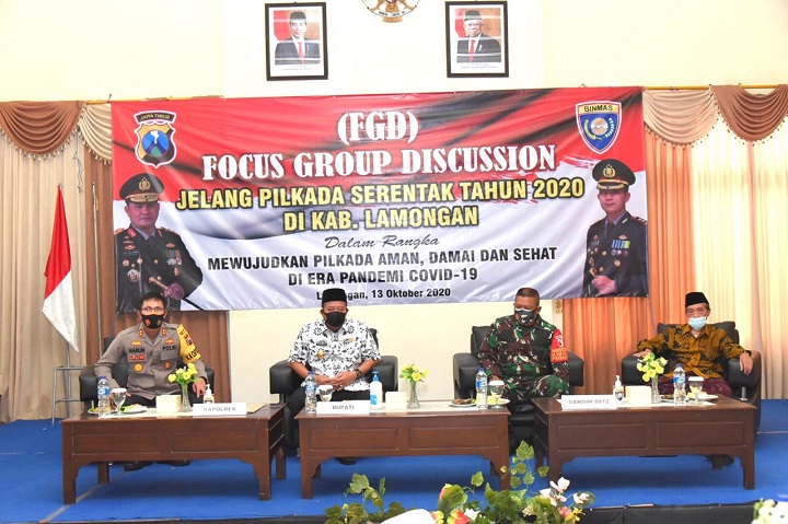 Kapolres Lamongan bersama Bupati, Dandim, ketua MUI, sebagai narasumber dalam FGD Pilkada Aman dan sehat. SP/MUHAJIRIN KASRUN