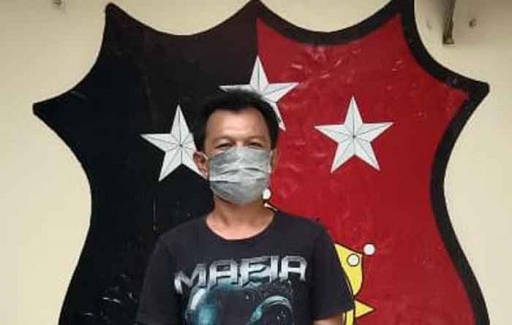 Asmad, pelaku pencurian accu truk saat diamankan.