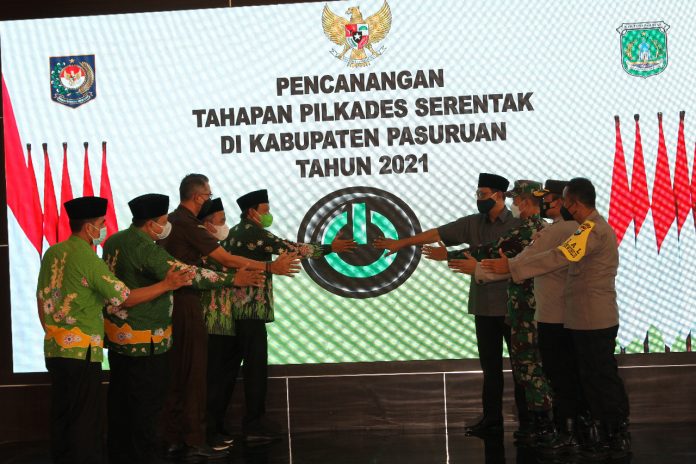 Proses pencanangan pilkades serentak di pendopo kabupaten, Kamis (10/6/2021).