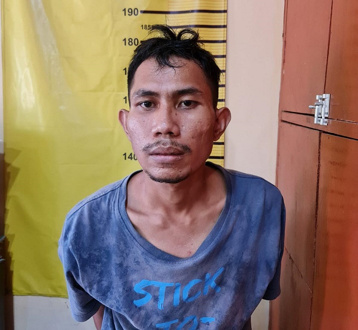 Tersangka M Hasan Ashari (26) saat diamankan Polsek Tambaksari. SP/Anggadia Muhammad 