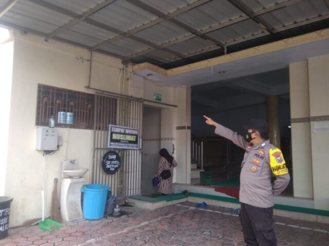 Polisi saat mendatangi lokasi kejadian.