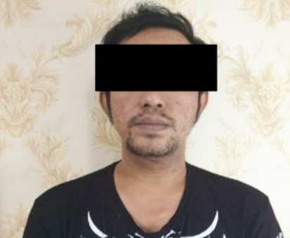 Tersangka peredaran pil koplo merk double L yang berhasil ditangkap anggota Satresnarkoba Polres Pelabuhan Tanjung Perak. SP/Ariandi.