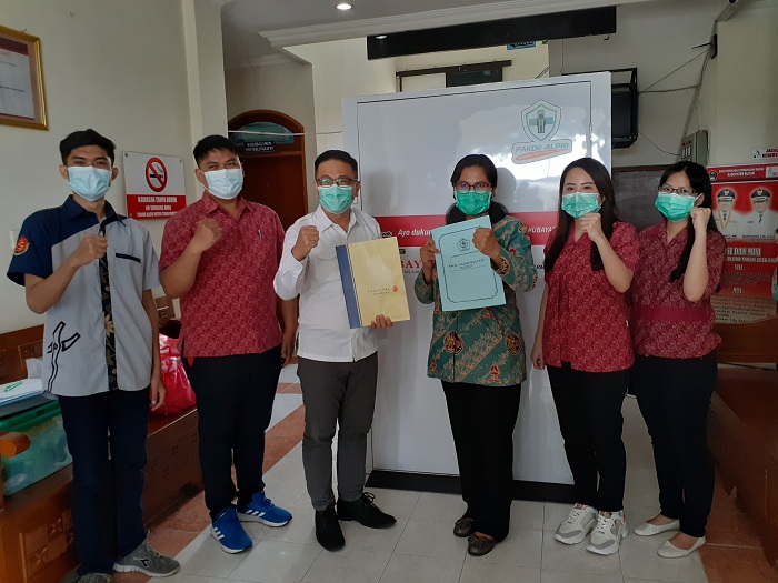 Universitas Surabaya gelar Program Pengabdian kepada Masyarakat dengan membantu tenaga medis sebagai garda terdepan, Senin (30/11/2020). SP/ MOCHAMMAD KASYFI FAHMI   