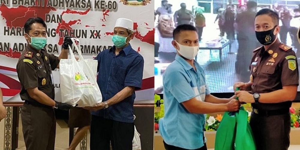 Kajari Tanjung Perak (KIRI)dan Kajari Surabaya (KANAN ) membagikan bantuan.  SP/BUDI