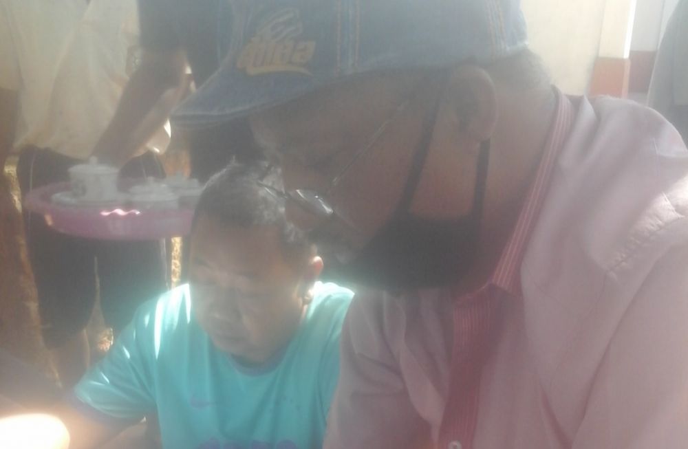 Moh. Ali memakai Masker, mewakili Masyarakat Jabbaan Dasuk Kab. Sumenep.SP/ar