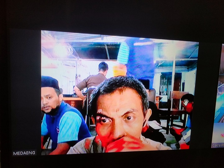 Ekspresi Susanto, yang mengikuti sidang vonis putusan secara daring. SP/Budi Mulyono