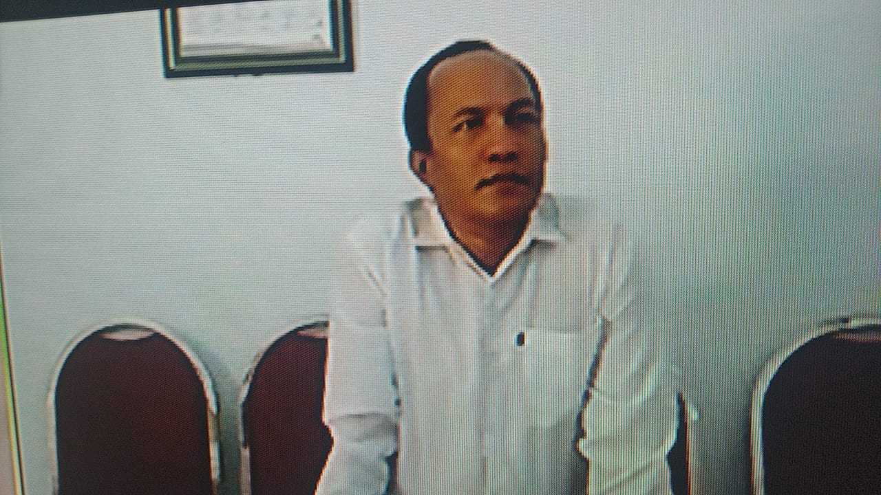 Terdakwa Zainul Arifin saat sidang telekonferensi.SP/Budi Mulyono.