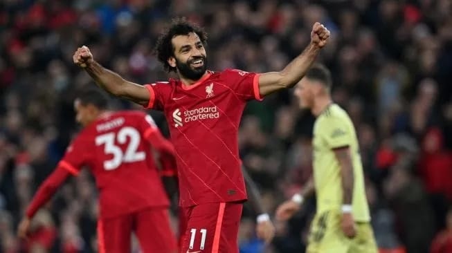 Ekspresi penyerang Liverpool Mohamed Salah usai mencetak gol ke gawang Arsenal di laga lanjutan Liga Inggris di Stadion Anfield, Minggu (21/11/2021) dini hari WIB, Liverpool menang 4-0.