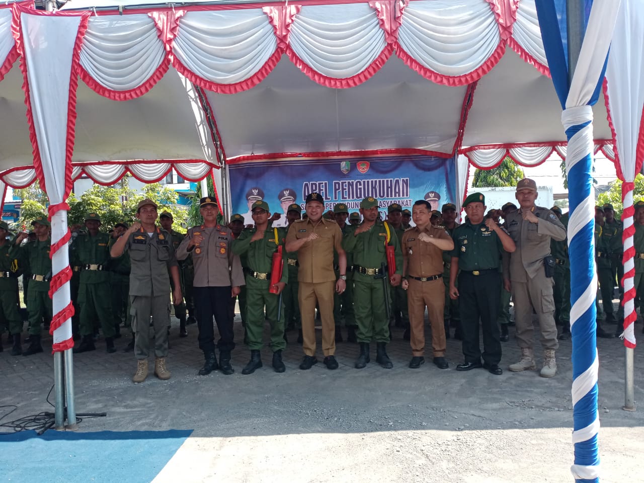 Pengukuhan 100 Linmas se-Kecamatan Tambelangan, Kabupaten Sampang.