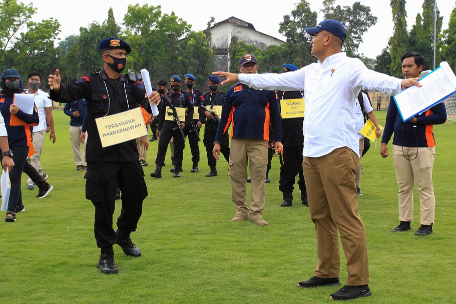 Rekronstruksi Tragedi Kanjuruhan di Mapolda Jatim, Rabu (19/10/2022). SP/Ariandi.