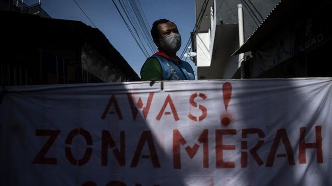 Minggu ini 34 kabupaten kota masuk zona merah. Bertambah satu daerah, sebelumnya 33. SP/ SIGID KURNIAWAN