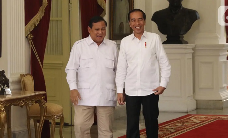 Presiden Joko Widodo tertawa saat menerima Ketua Umum Partai Gerindra Prabowo Subianto di Istana Merdeka, Jakarta. SP/ JKT