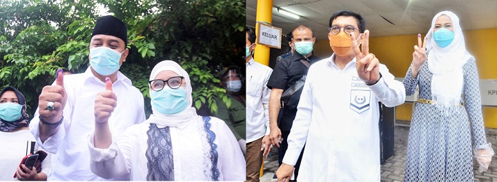 Paslon no 1 Eri Cahyadi dan Istri  paslon no 2 MA dan istri  usai mencoblos. SP/Patrik Cahyo/Arlana