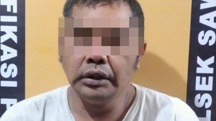 Jemi Martak Sudianto (40), pelaku pencurian saat diamankan polisi.