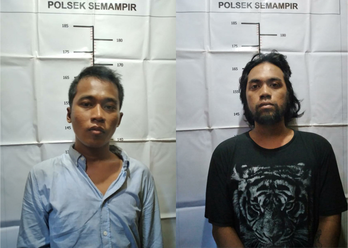 Kedua pelaku saat diamankan di Polsek Semampir. SP/Mahbub Fikri