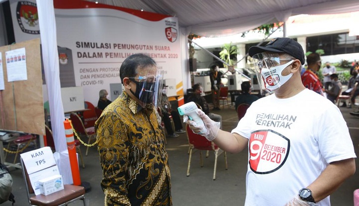 Simulasi pencoblosan pilkada 2020 dengan menerapkan protokol kesehatan.
