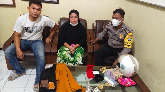 Tersangka Yulis Amalia saat dijemput polisi usai membobol rumah korban.